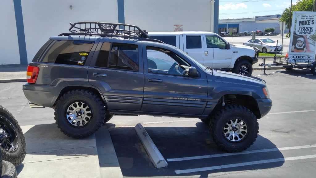 2000 Jeep Grand Cherokee- Installed 3" Zone Off Road Lift,17X9 Fuel Vector Rims w/33X12/50 R17 Nitto Mud Grapler Tires w Go Rhino Roof Rack